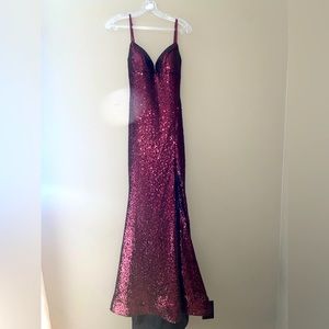 selling a red/maroon Sherri Hill prom dress size 6